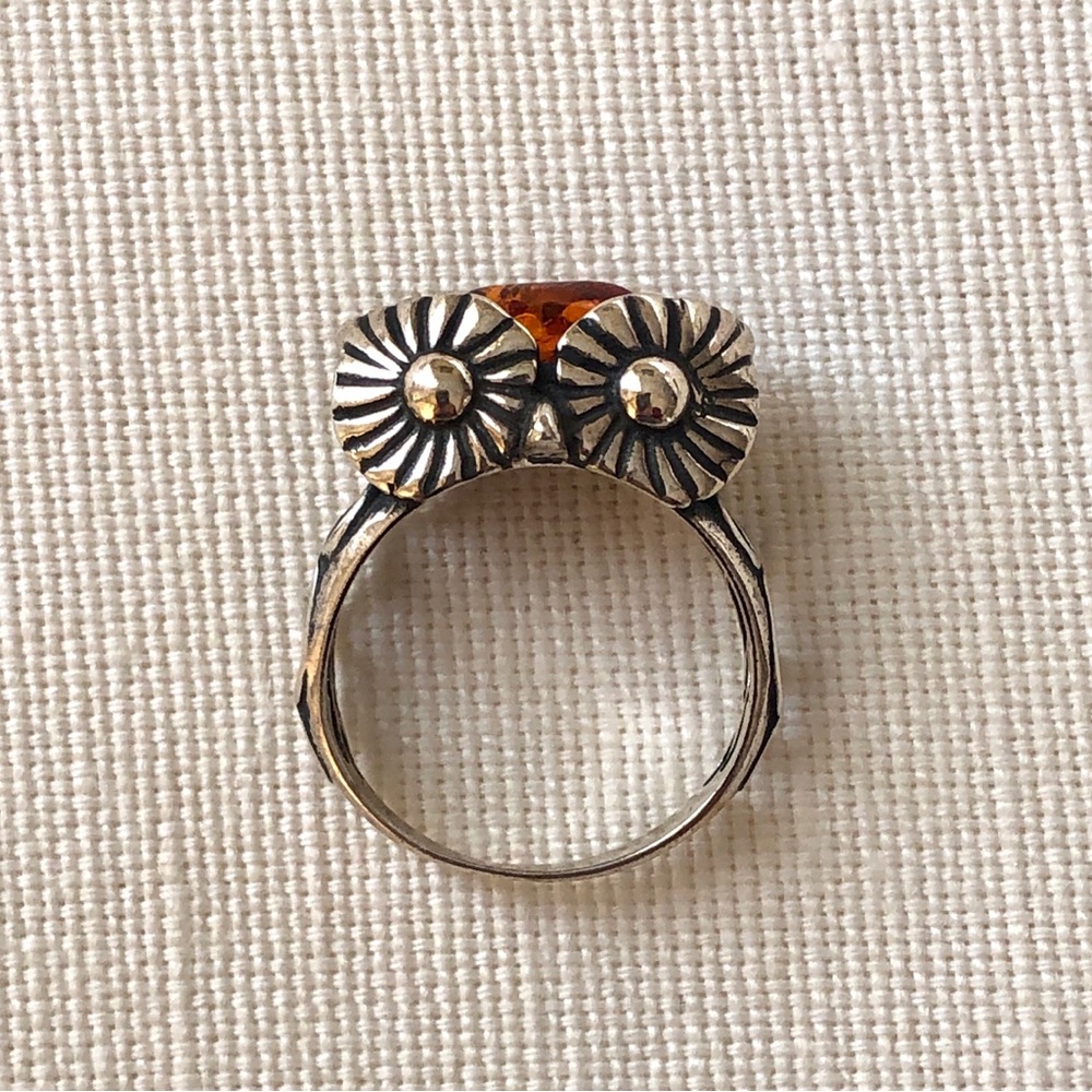 Sterling silver openwork owl ring with amber gemstone. Marked sterling.